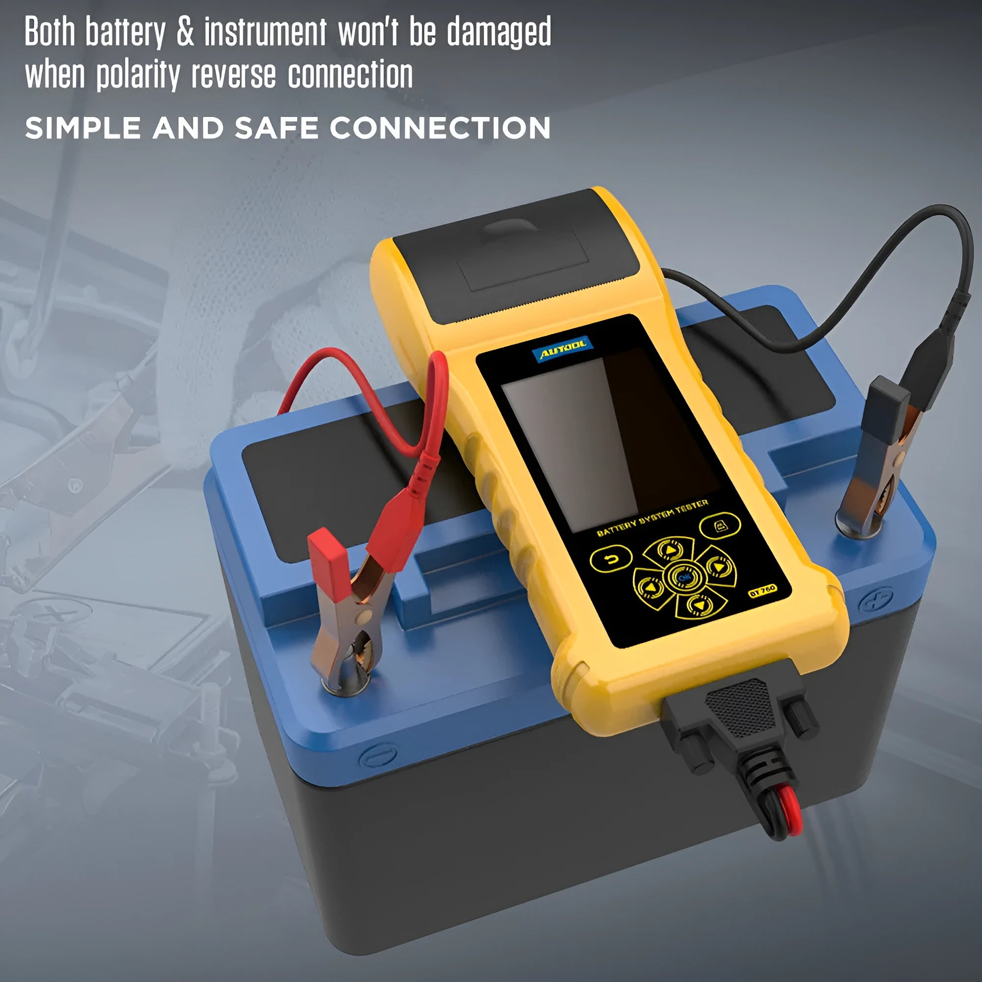Autool BT760 vehicle battery tester with colour screen, thermal printer, and test clips on a workshop bench.