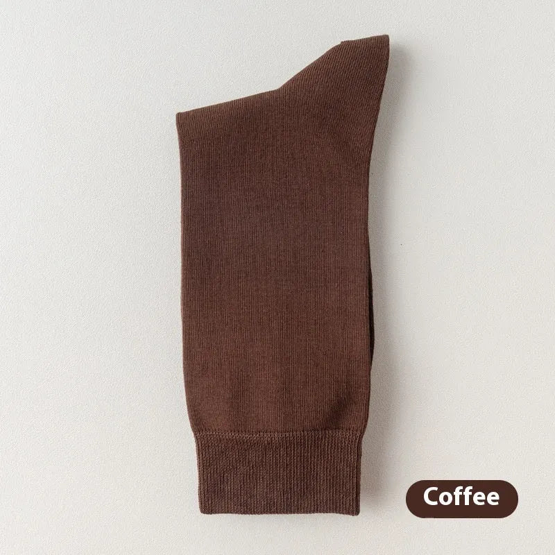 Mid-calf length men's business socks in solid colours, made from pure combed cotton.