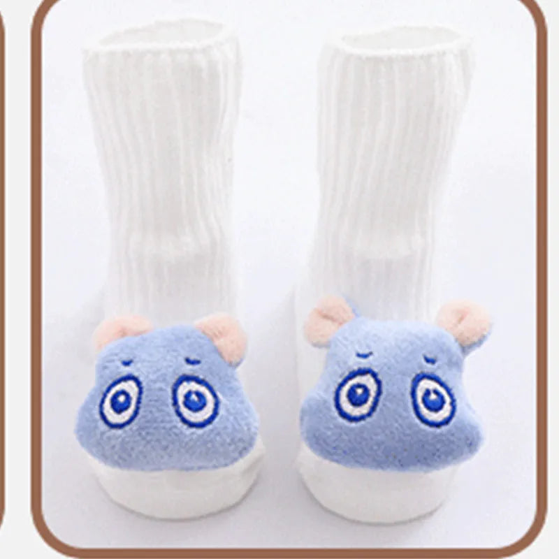 Cotton baby floor socks in various colours and patterns including bows, stars, and animal designs