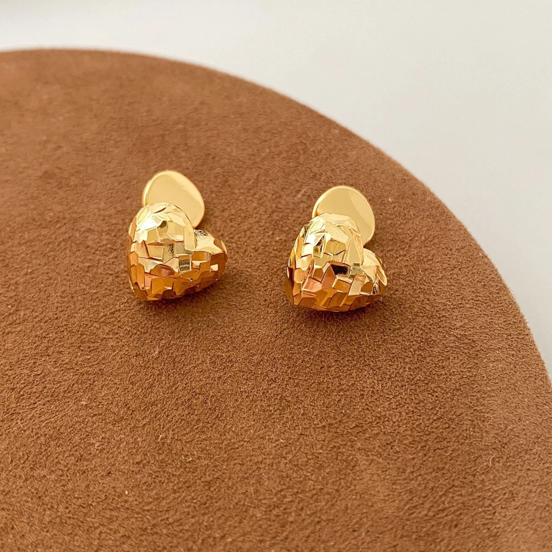Gold copper heart shaped ear clips without ear holes on non-pierced earlobe, simple style