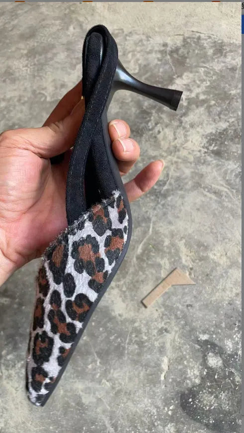 Leopard print suede women's sandals with a pointed toe and scatter heel.
