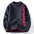 Men's loose-fit knitted pullover sweater with ribbed hem in grey, shown on a hanger.