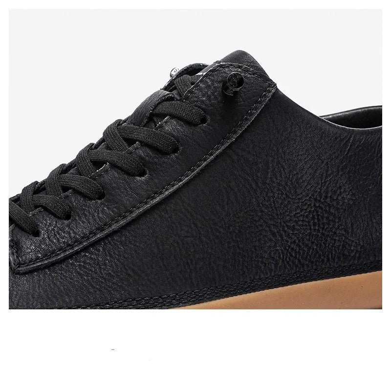 Men's black casual leather shoes with round toe and lace-up lanyard on a white background.