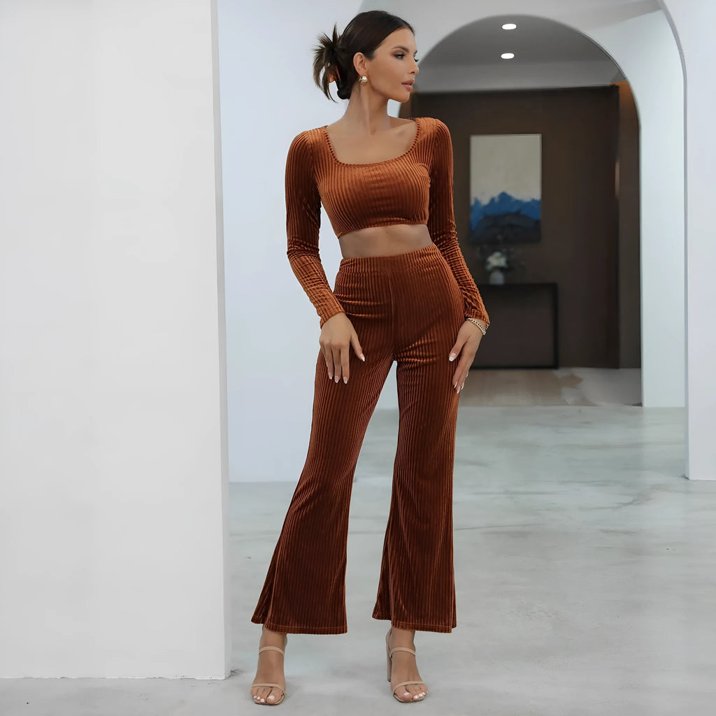 Caramel coloured long sleeve sweater and trousers casual set on a hanger