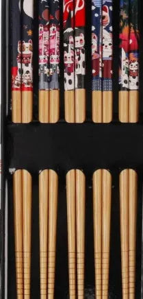 Set of five pairs of bamboo chopsticks with Japanese lucky cat pattern in a gift box.