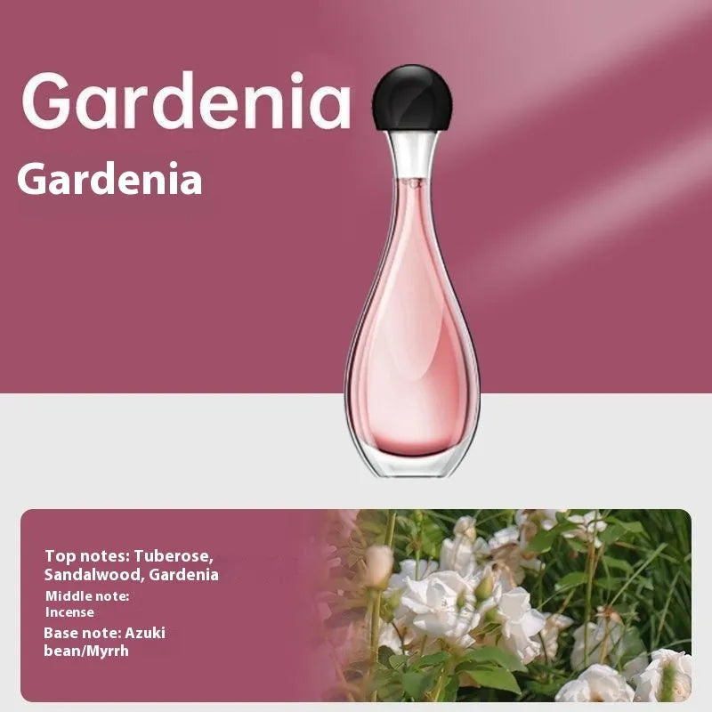 White ultrasonic aroma diffuser with control buttons and mist output, shown with essential oil bottle