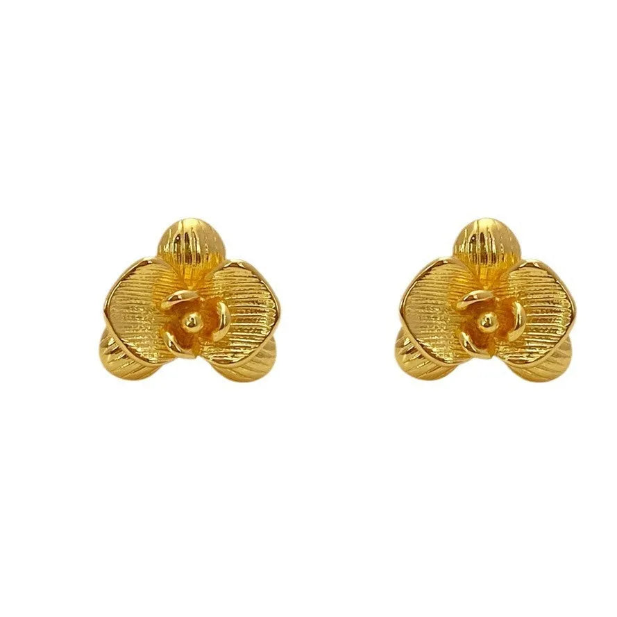 Retro style flower earrings with petal detailing in gold or silver electroplated finish on copper
