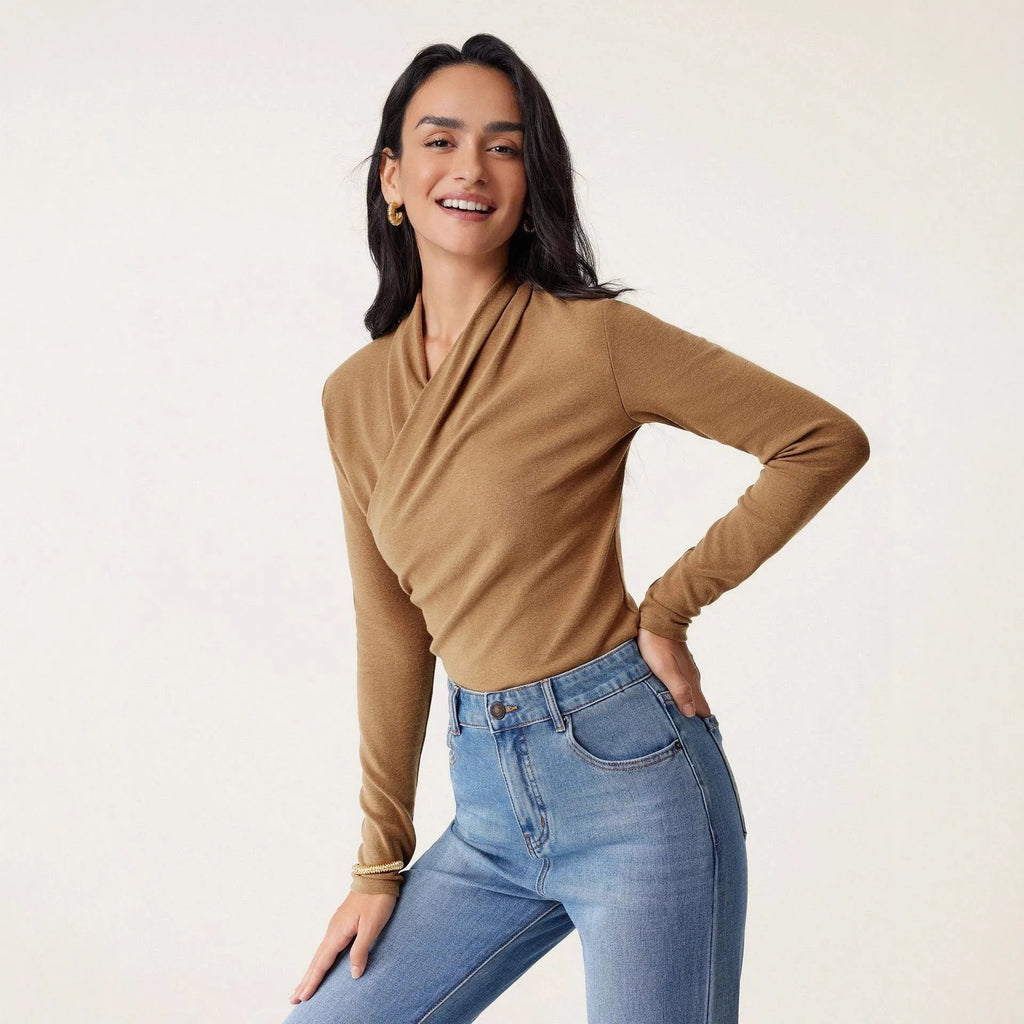 Camel-coloured women's slim fit pullover sweater with long sleeves.