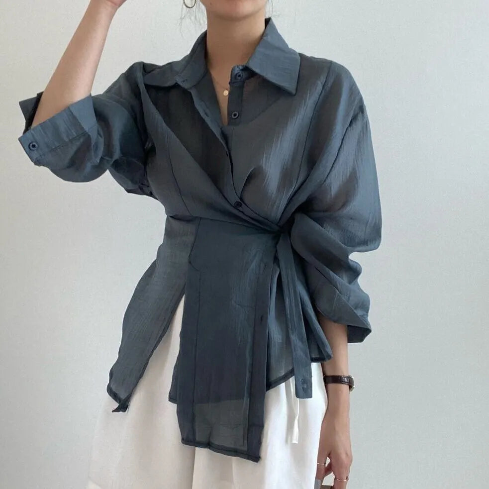Irregular buckle lapel long sleeve shirt in smoky gray polyester fibre