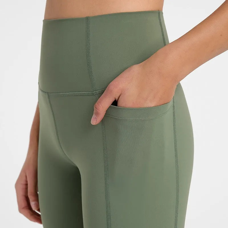 Women's tight-fitting super stretch sports shorts in a solid colour, shown on a model.