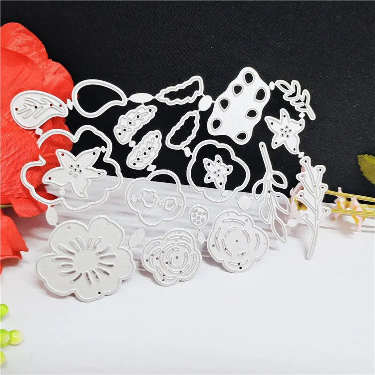 Silver carbon steel cutting die with plant design pattern measuring 14.3 by 9.9 cm