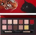 Explorer twelve-colour animal themed eye shadow palette open showing shades.