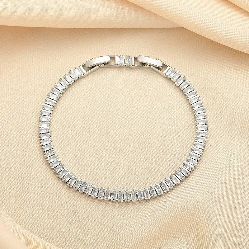 Women's geometric brass bracelet with full diamond zircon look in quadrilateral design