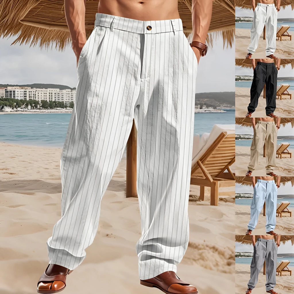 Man wearing straight-cut, high-waisted linen trousers with a wide leg and striped pattern in a light colour.