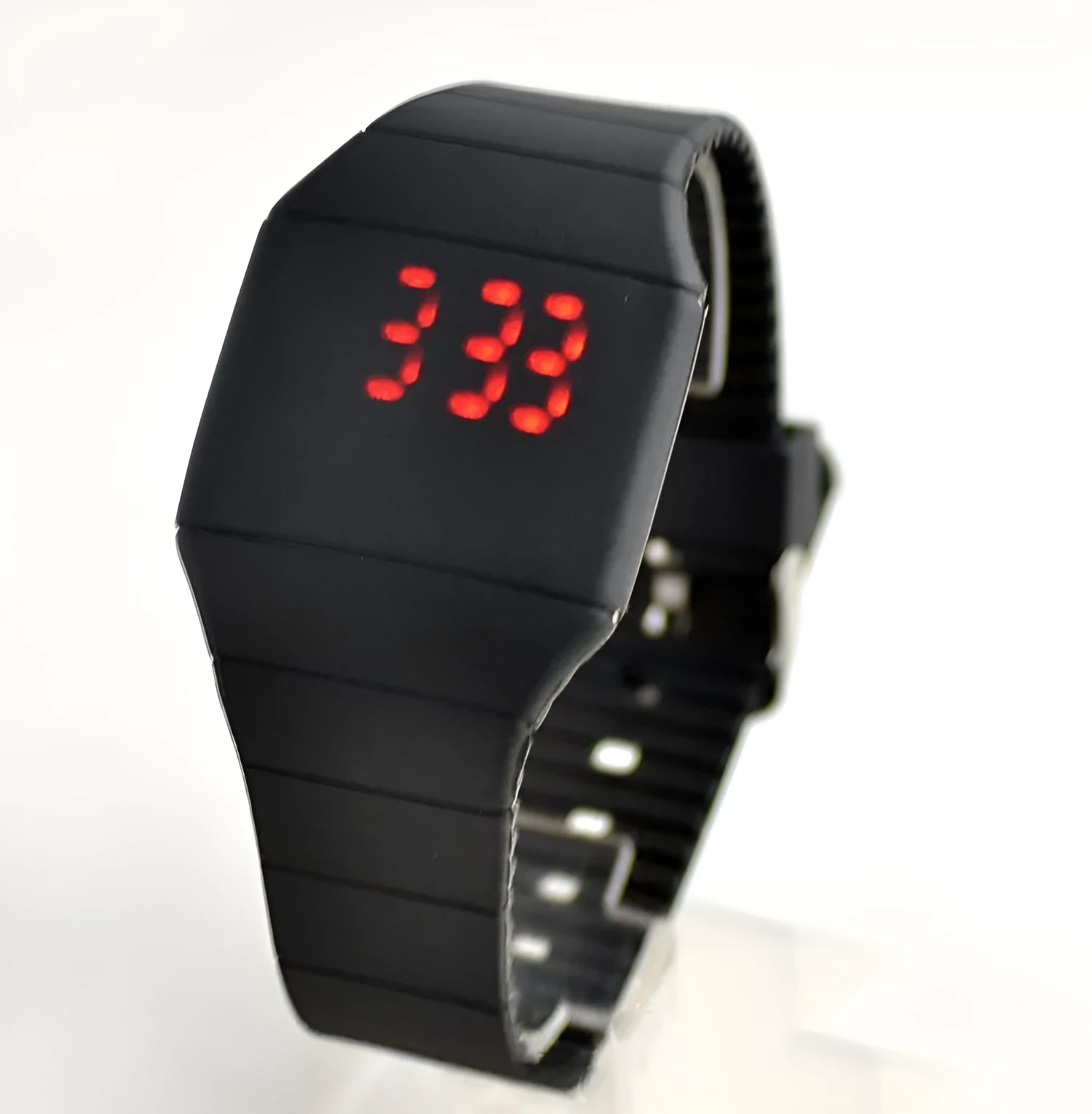 Square electronic touch screen watch with plastic case and PU strap on a wrist.