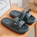 Women's deer horn pattern flip-flop slippers in light yellow with a textured EVA sole.