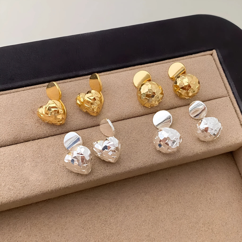 Gold copper heart shaped ear clips without ear holes on non-pierced earlobe, simple style