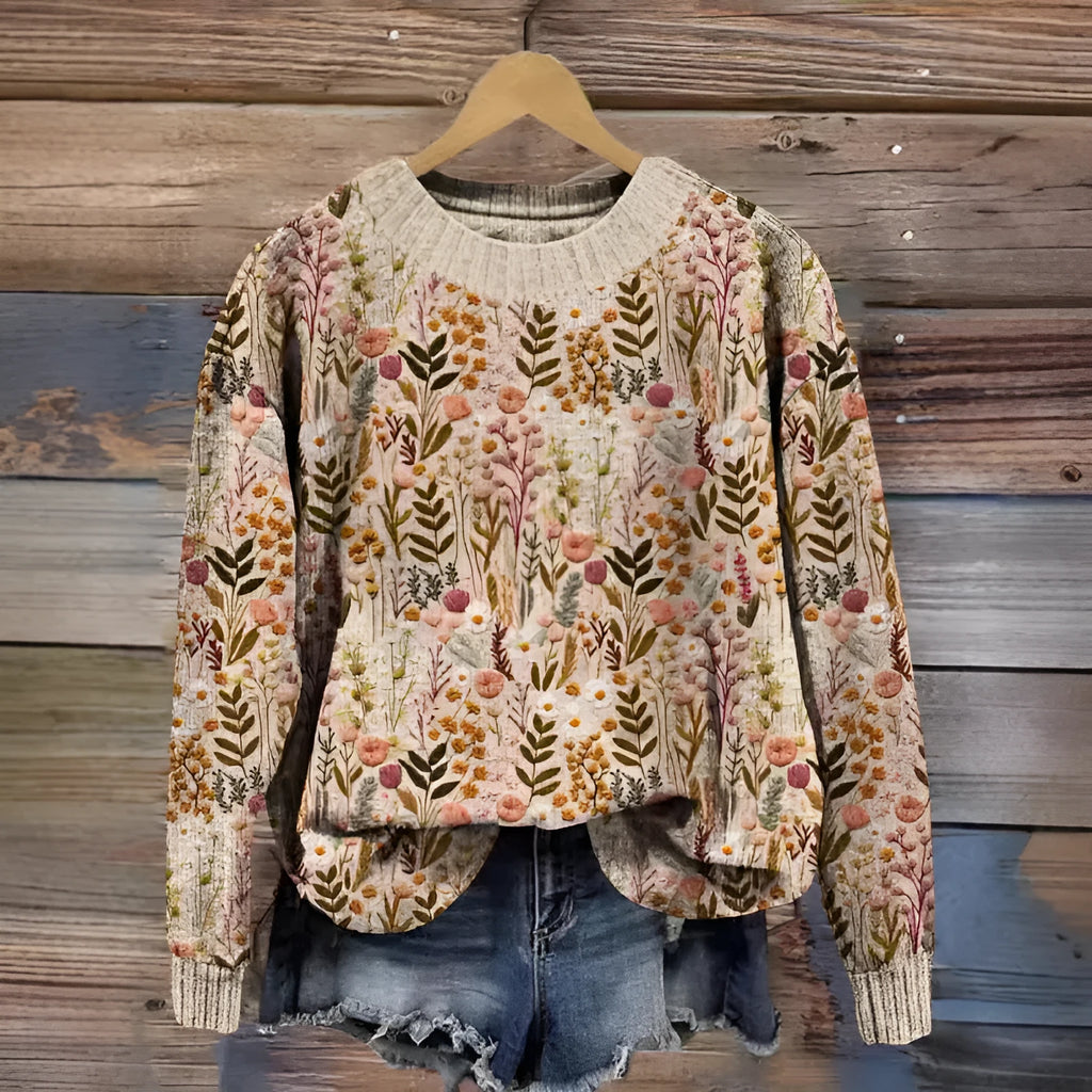 Women's round neck long sleeve sweater with a digital floral print pattern.