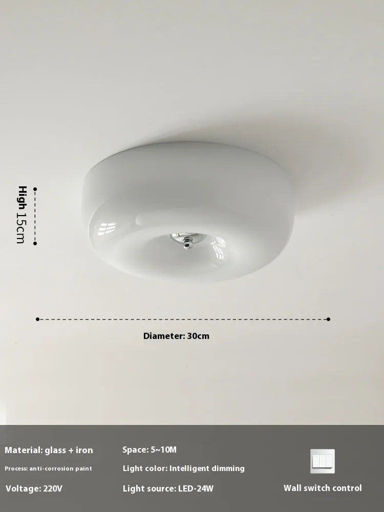 Cream coloured American style bedroom ceiling lamp with a modern vintage design shown in a bedroom setting.