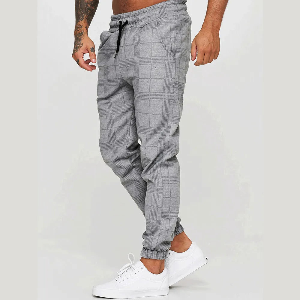 Cotton printed casual tapered trousers for men in black side view
