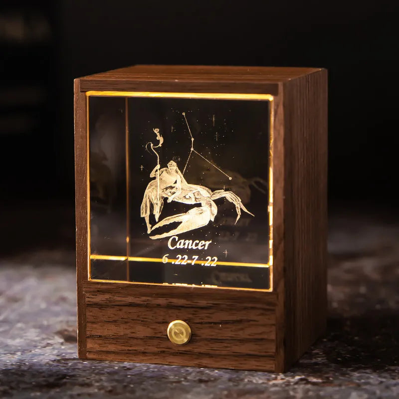 Crystal LED table lamp with black walnut base and K9 crystal showing constellation night light effect