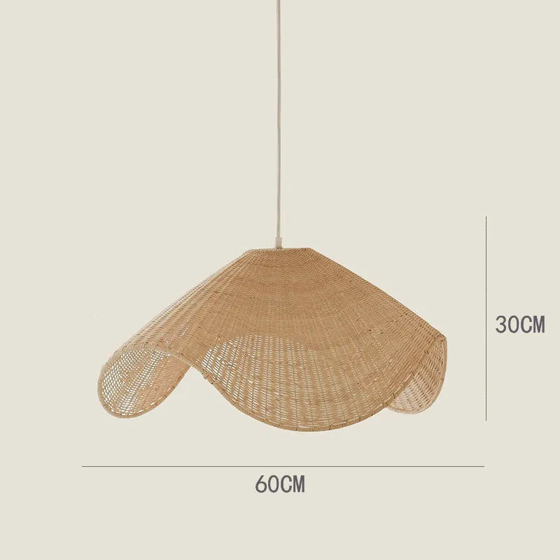 Handmade bamboo and rattan pendant ceiling lamp with a woven willow shade in warm white light.