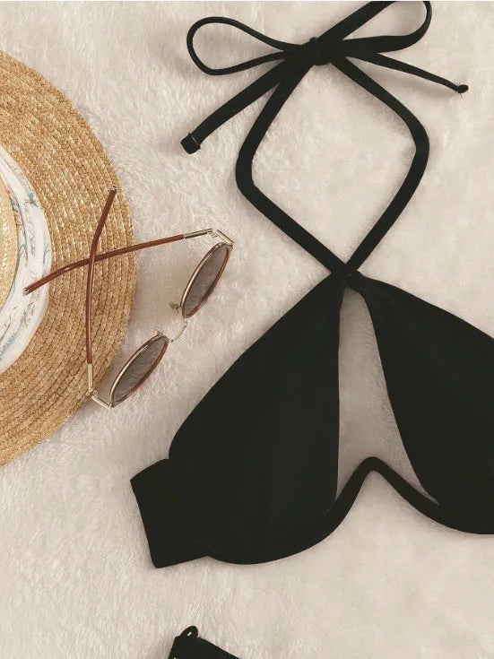 Women's halter neck bikini swimsuit in solid colour with briefs style
