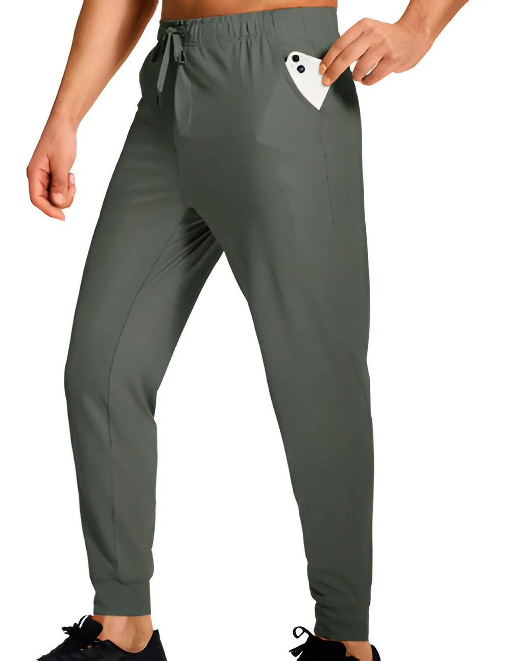 Men's solid colour loose fit casual trousers in polyester fabric on a hanger.
