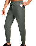 Men's solid colour loose fit casual trousers in polyester fabric on a hanger.