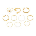 Gold openwork flower ring with alloy construction and electroplated glossy finish