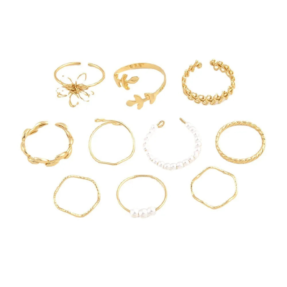 Gold openwork flower ring with alloy construction and electroplated glossy finish