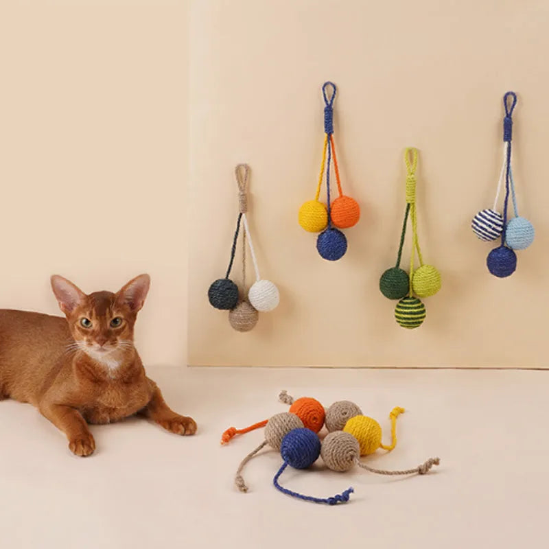 Blue, green, and multi-colour cat toy set with a teaser stick, catnip balls, and a wand.