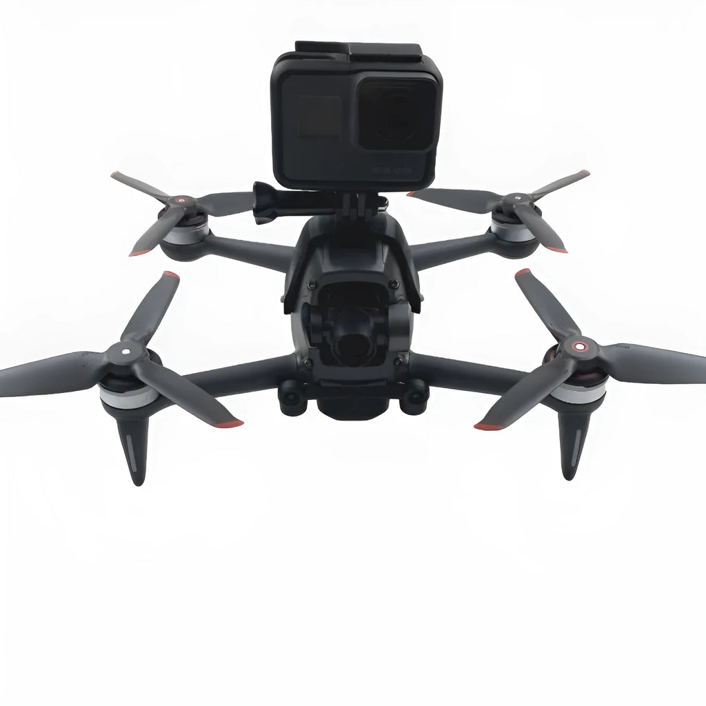 3D printed hard plastic expansion bracket with sponge padding for top-mounting GoPro cameras on FPV drones.