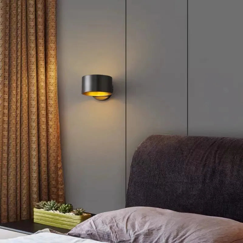 Modern simple style copper wall lamp in a choice of black or gold finish.