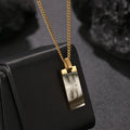 Custom stainless steel photo necklace with engraved eye design, geometric shape, and electroplating finish in a range of colours