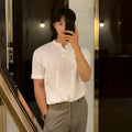 Men's black slim-fit short-sleeved knitted pullover shirt made from Vinylon fabric.