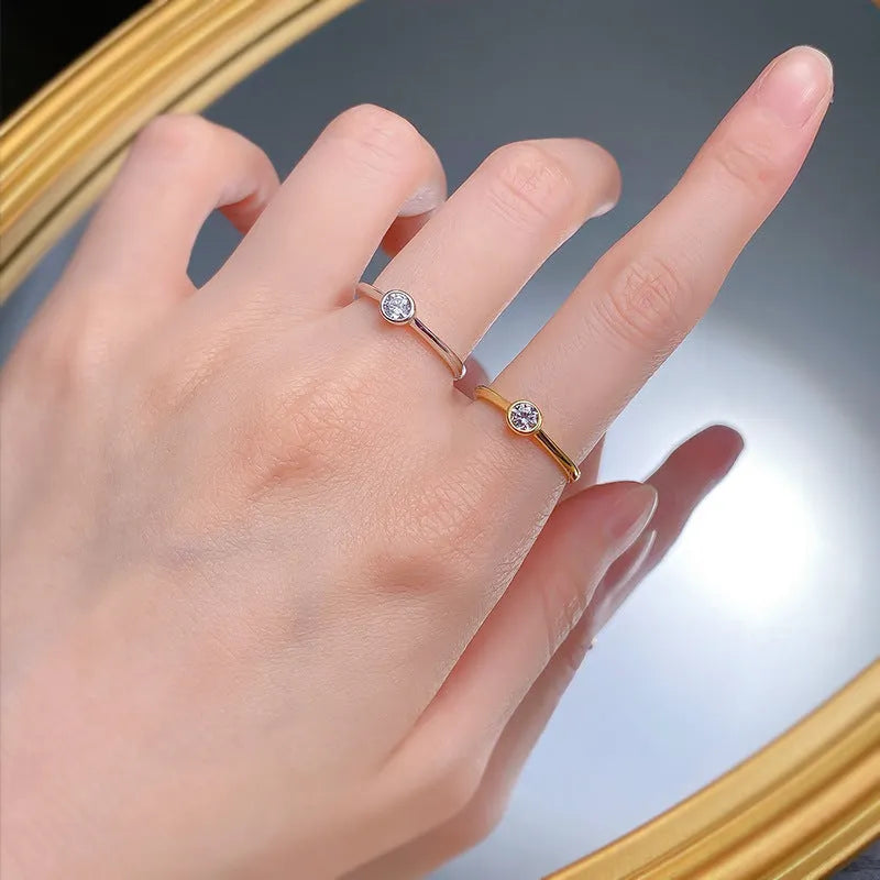 Minimalist silver crown-shaped ring with linear detailing in platinum or gold finish