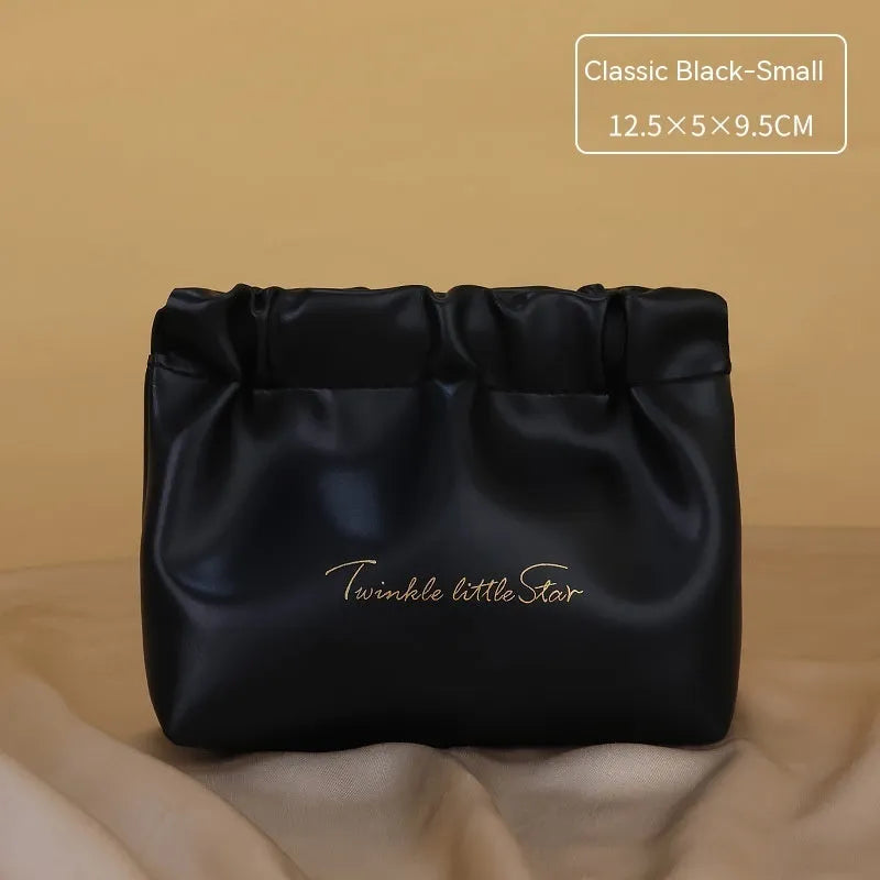 Leather travel toiletry bag in caramel mocha colour with dry wet separation compartments