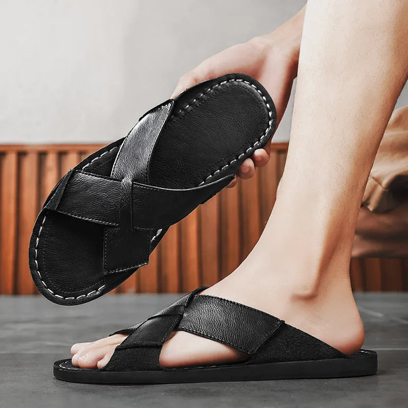 Men's black casual slip-on sandals with a genuine pigskin leather upper and rubber sole