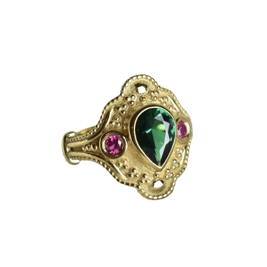 Gold geometric women's ring on display showing alloy construction with electroplated finish