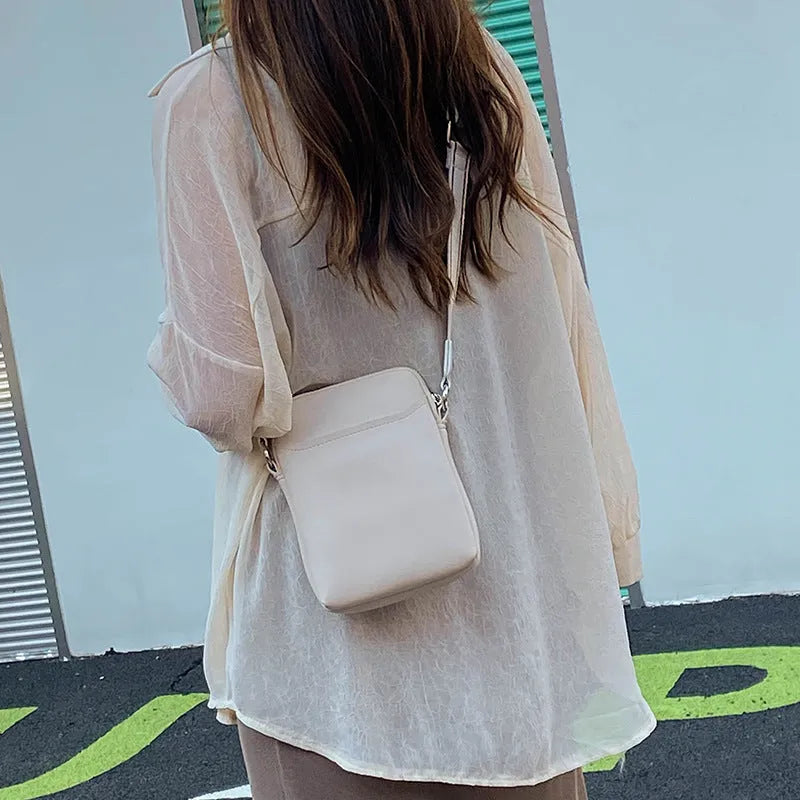 Solid colour PU mobile phone crossbody bag shown in black, beige, khaki, and green.