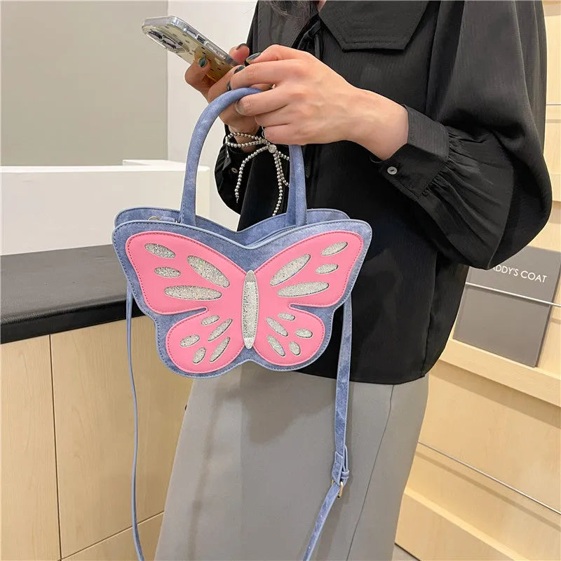 Ladies' portable crossbody small square bag in black with contrast colour detailing showing 27cm width