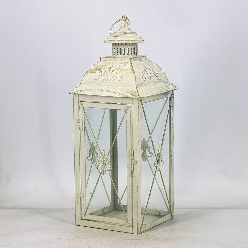 European style wrought iron floor-standing storm lantern with tempered glass panels in black or white finish