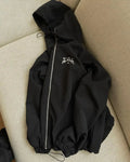 Men's British-style loose fit hooded sunscreen jacket in grey colour showing attached hood and polyester fabric
