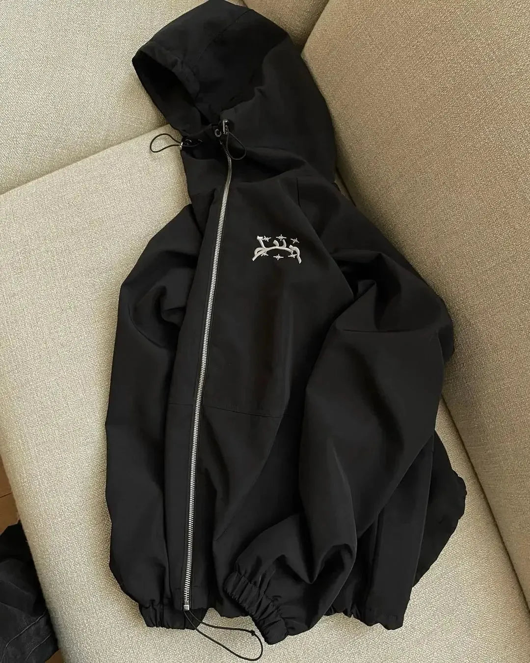 Men's British-style loose fit hooded sunscreen jacket in grey colour showing attached hood and polyester fabric