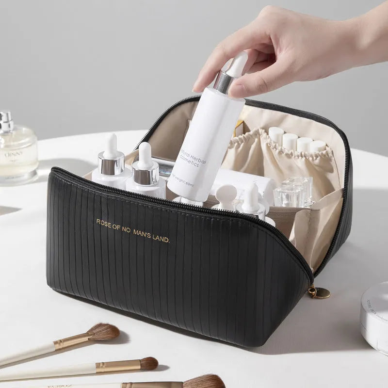 Vertical pattern cubic PU makeup bag in beige, shown with dimensions 22.5cm by 12.5cm.