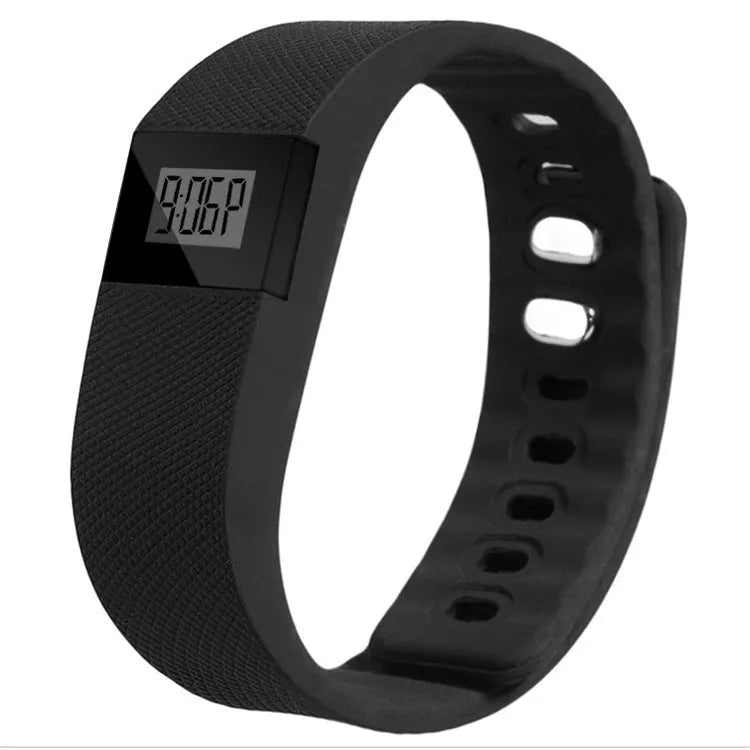 Colourful plastic bracelet pedometer showing step distance calorie tracking on wrist
