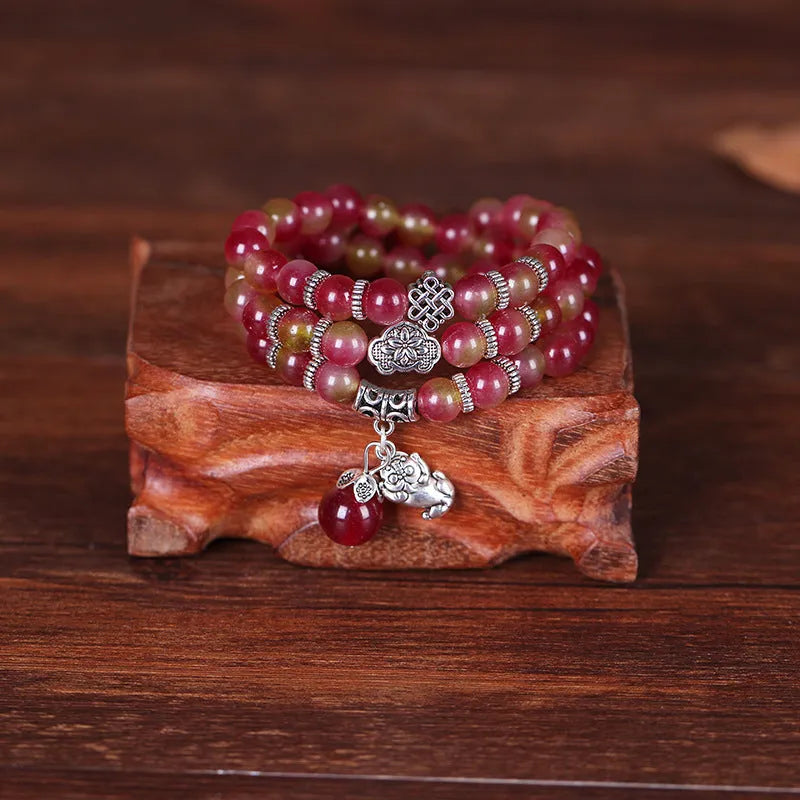 Handmade natural watermelon crystal bracelet with Chinese knotting in elephant style geometric design