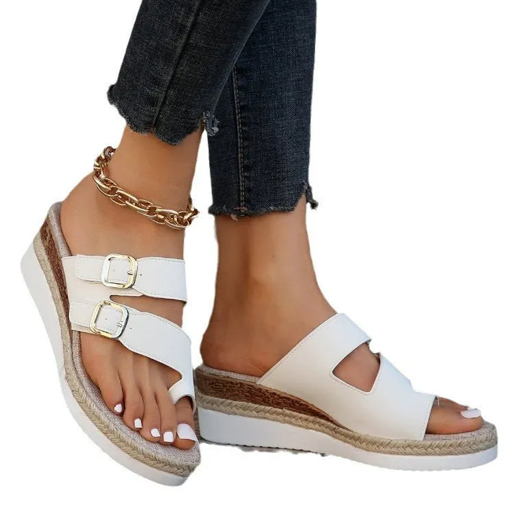White patent leather wedge sandals with woven upper and finger fit design