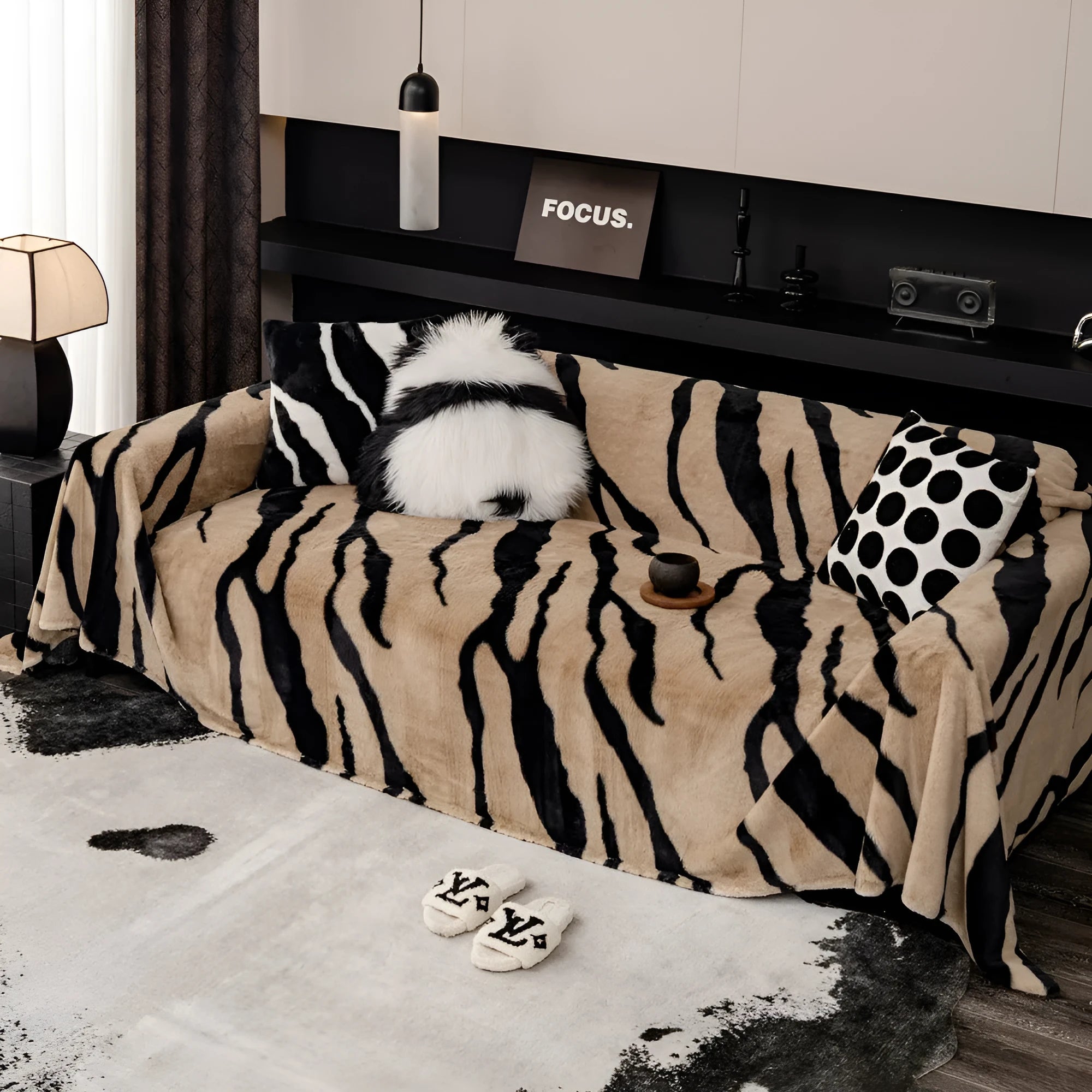 Zebra pattern flannel sofa cover with matching pillowcase in caramel colour on grey sofa
